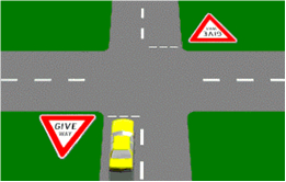 A GIVE WAY sign at an intersection means that you must -