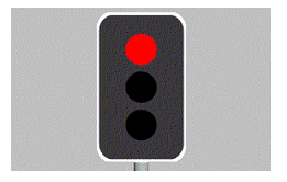 As you approach an intersection with traffic lights, the yellow light turns to red. You must -