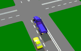 You are driving behind a long vehicle (as shown) which has a sign saying DO NOT OVERTAKE TURNING VEHICLE. The long vehicle indicates that it is going to turn left. You -